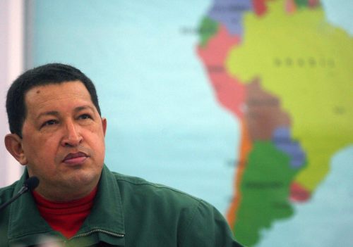 Venezuelan President Hugo Chavez listens during a ceremony at the Mir